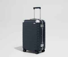 The Aluminum Edge Bigger Carry-On in Navy Blue